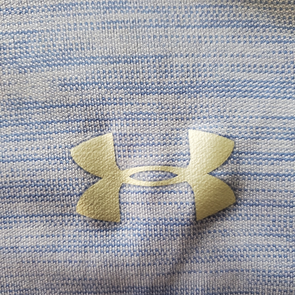 Under Armour HeatGear 1/4 zip, long sleeve top.  Blue and pink heathered color.